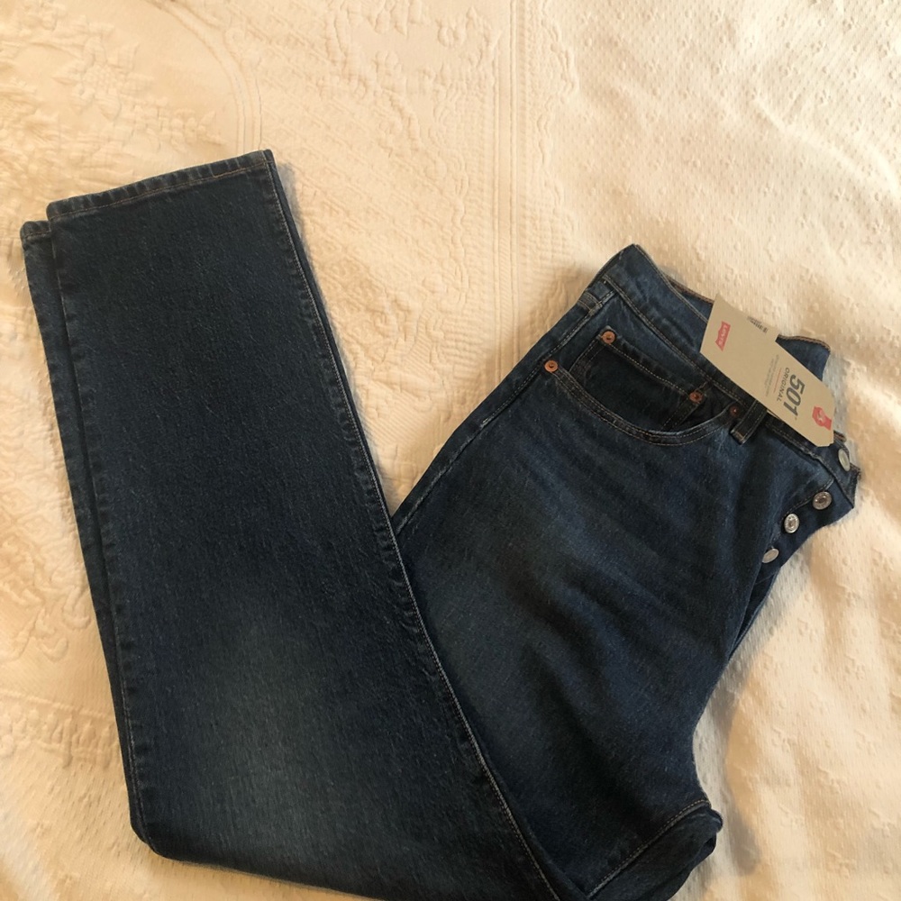 Levi’s woman’s original 501, high rise, straight leg with signature button fly.